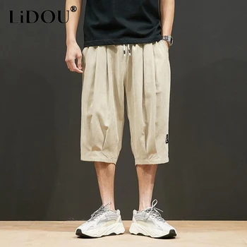 Ljeto 2023, nove čvrste hlače s fleksibilnim gumicom u struku dužine do koljena, muške hlače u japanskom stilu, besplatne dnevne modne udobne široke hlače
